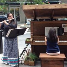 Jesse McMann-Sparvier and Claire Butler warm up in anticipation for our first duet street piano performance. 
#IAMDOWNTOWN #streetpiano
#yyc