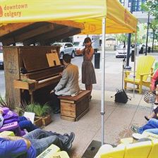 Despite the sprinkling, Laura Reid & Mark Limacher perform for us in this intimate setting at the Woodlands #StreetPiano, 332 6 Ave. till 1PM. More events at DowntownCalgary.com #IAMDOWNTOWN